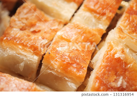 Delicious layers of turkish borek on a plate Delicious layers of turkish borek on a plate 131316954