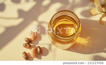 Jojoba oil on glass jar natural essence extract for skincare or other 131317456