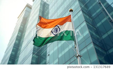 India's flag is displayed in front of a building, marking Independence Day with a colorful background 131317689