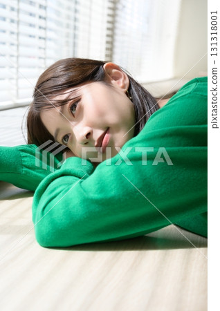 A woman sleeping in the sunlight 131318001