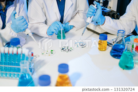 Scientist team with tablet and laptop, laboratory and ecofriendly science. Agriculture, research and scientists 131320724