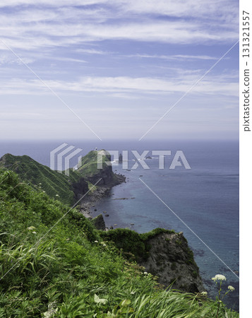 A beautiful sculpture jutting out into the sea A beautiful sculpture jutting out into the sea 131321557