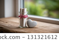 A glass jar of wishes or love letters with a heart stone 131321612