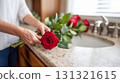 Preparing a romantic gift of flowers for Valentine's Day or an anniversary 131321615