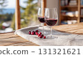 Two glasses of red wine at a cozy winter mountain resort 131321621