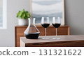Red wine in a decanter and two glasses in a modern interior 131321622