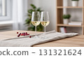Two glasses of white wine for a romantic date night at home 131321624