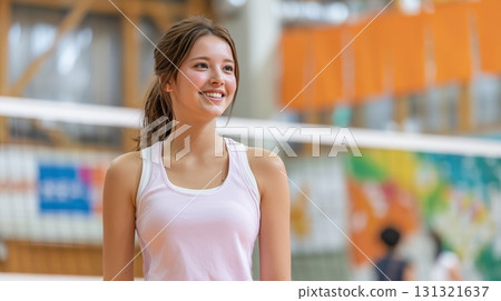 Female volleyball team members' bright smiles on the court 131321637