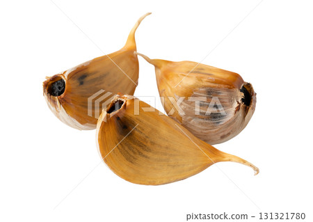 Black garlic with skin on transparent background (png) 131321780