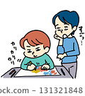 A mother watches her child draw a picture 131321848