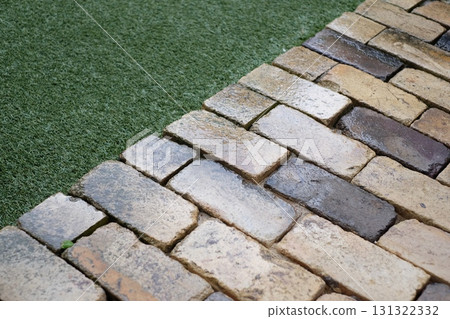 Antique bricks wet with rain 131322332