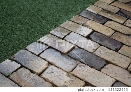 Antique bricks wet with rain 131322333