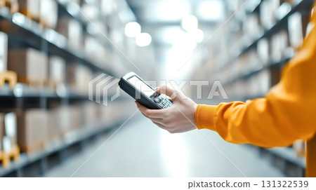 Efficient warehouse worker using scanner to manage shipments and inventory 131322539
