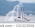 Japan Coast Guard patrol boat Kotobiki performing a water spraying demonstration in Hiroshima Bay 131323058