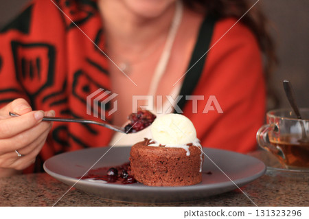 Dessert with ice cream and berry sauce Dessert with ice cream and berry sauce 131323296