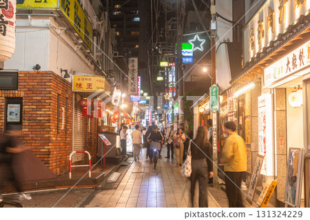 Tokyo: Nakano Station entertainment district and downtown Tokyo at night Tokyo: Nakano Station entertainment district and downtown Tokyo at night 131324229