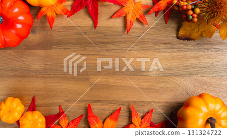 Autumn leaves and pumpkin background for text insertion 131324722
