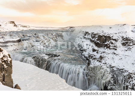 Winter scenery of Gullfoss - A magnificent waterfall and snowy landscape in Iceland Winter scenery of Gullfoss - A magnificent waterfall and snowy landscape in Iceland 131325011