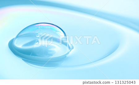 Powder blue matte background with iridescent bubble effect 131325043