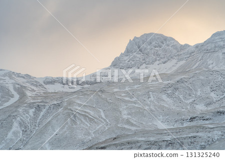 Winter scenery of the Snaefellsnes Peninsula: Snowy mountains and fishing villages, a spectacular view of Iceland 131325240