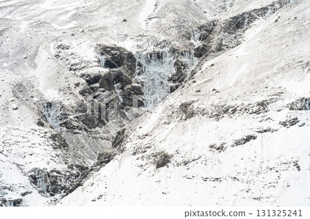 Winter scenery of the Snaefellsnes Peninsula: Snowy mountains and fishing villages, a spectacular view of Iceland 131325241