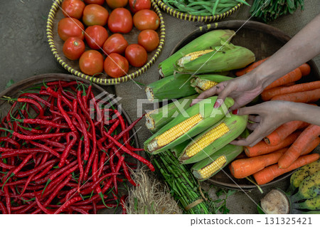 A Bright and Vibrant Vegetable Market Display Featuring Fresh Produce and Colors Galore 131325421