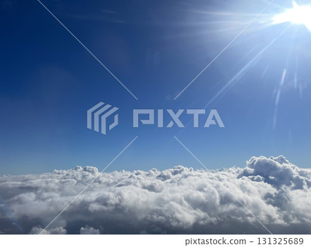 Sunlight shining above the clouds 131325689