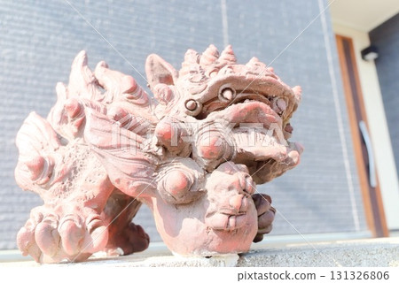 Shisa statue guarding the entrance 131326806