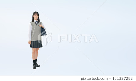 Full-body photo of a female student in uniform Full-body photo of a female student in uniform 131327292