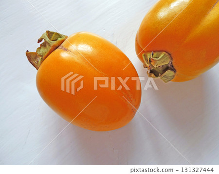 A simple photo of Saijo persimmons in a blend against a white background 131327444