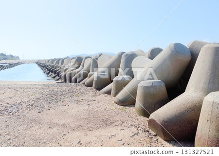 Tetrapods and breakwaters line the sea at Fujie Coast 131327521
