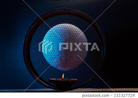 Karwa Chauth strainer and Diya oil lamps. Karwa Chauth celebration on the night. Karwa Chauth strainer and Diya oil lamps. Karwa Chauth celebration on the night. 131327729