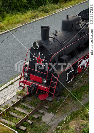 A beautifully restored Vintage Steam Locomotive featuring stunning Red Star Detailing 131327828