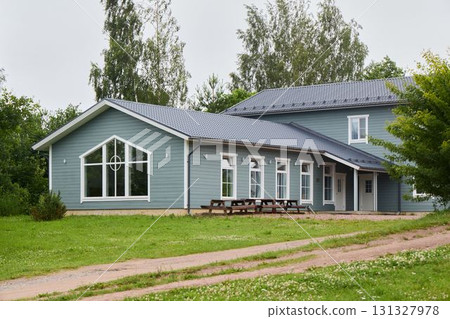 A Modern Green House that boasts a Spacious Yard and beautifully Scenic Surroundings all around 131327978