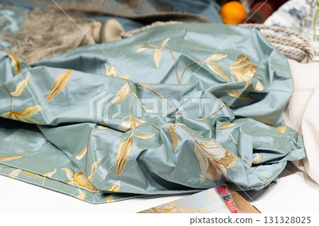 This Elegant Crumpled Fabric with Floral Designs is perfect for enhancing Home Decor 131328025