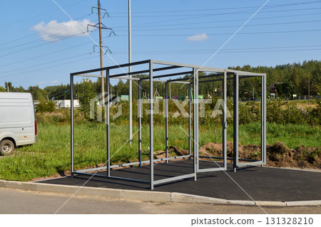 The Steel Framework of a Bus Shelter is currently being constructed and assembled on site The Steel Framework of a Bus Shelter is currently being constructed and assembled on site 131328210