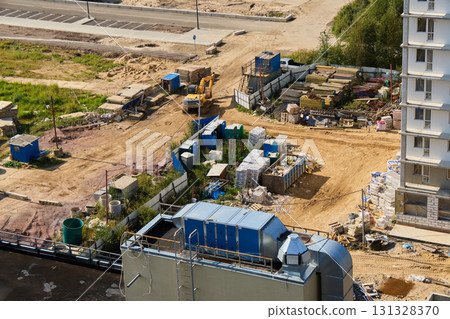 Developing construction sites entails using heavy machinery along with necessary materials 131328370