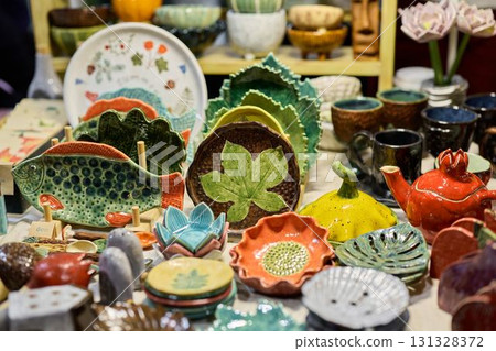 Discover the vibrant handmade ceramics on display at the Artisan Market near you 131328372