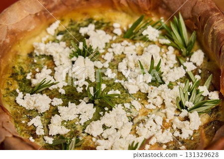 This is a Delicious Herb and Cheese Quiche that has been Freshly Baked to perfection This is a Delicious Herb and Cheese Quiche that has been Freshly Baked to perfection 131329628