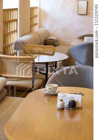 Stylish Caf Interior with Modern Furniture and Cozy Atmosphere Stylish Caf Interior with Modern Furniture and Cozy Atmosphere 131329749