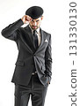bussinessman in black suit and hat fashion on white background 131330130