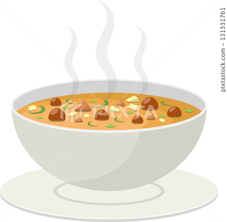 Steaming bowl of hearty soup with meatballs and vegetables, served on a pristine white plate. 131331761