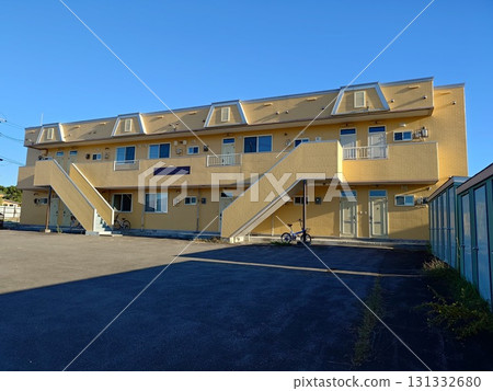 Orange-colored apartment building 131332680