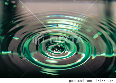 382.Concentric Ripples With Green Light On Liquid Surface 382.Concentric Ripples With Green Light On Liquid Surface 131332956