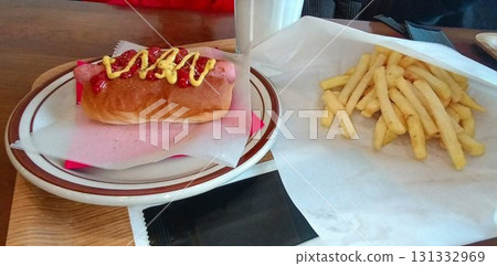 Savory grilled sausage... "Hot dog and french fries" 131332969