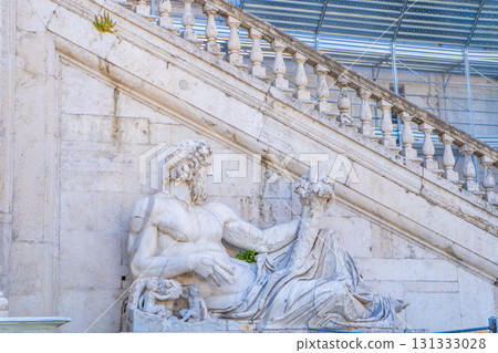 Statue with horn of plenty in Piazza del Campidoglio, in Rome Statue with horn of plenty in Piazza del Campidoglio, in Rome 131333028