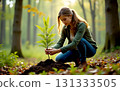 woman planting a tree, weeding and digging in the garden for environment 131333505