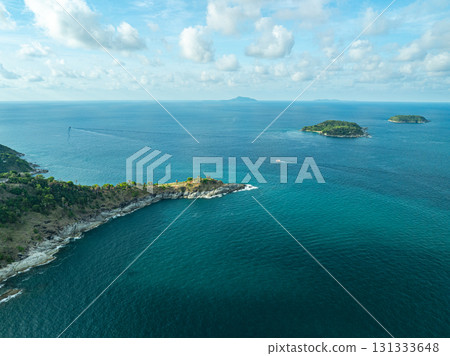 Aerial view A rocky promontory that juts out into the sea at Laem Promthep Cape viewpoint. 131333648