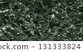 Elegant dark green marble texture with subtle white veins throughout. 131333824