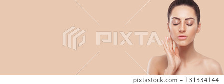 Portrait Of A Woman With A Beautiful Face And Perfect Skin. Skin Care. Cosmetology, Beauty And Spa. Panorama Portrait Of A Woman With A Beautiful Face And Perfect Skin. Skin Care. Cosmetology, Beauty And Spa. Panorama 131334144